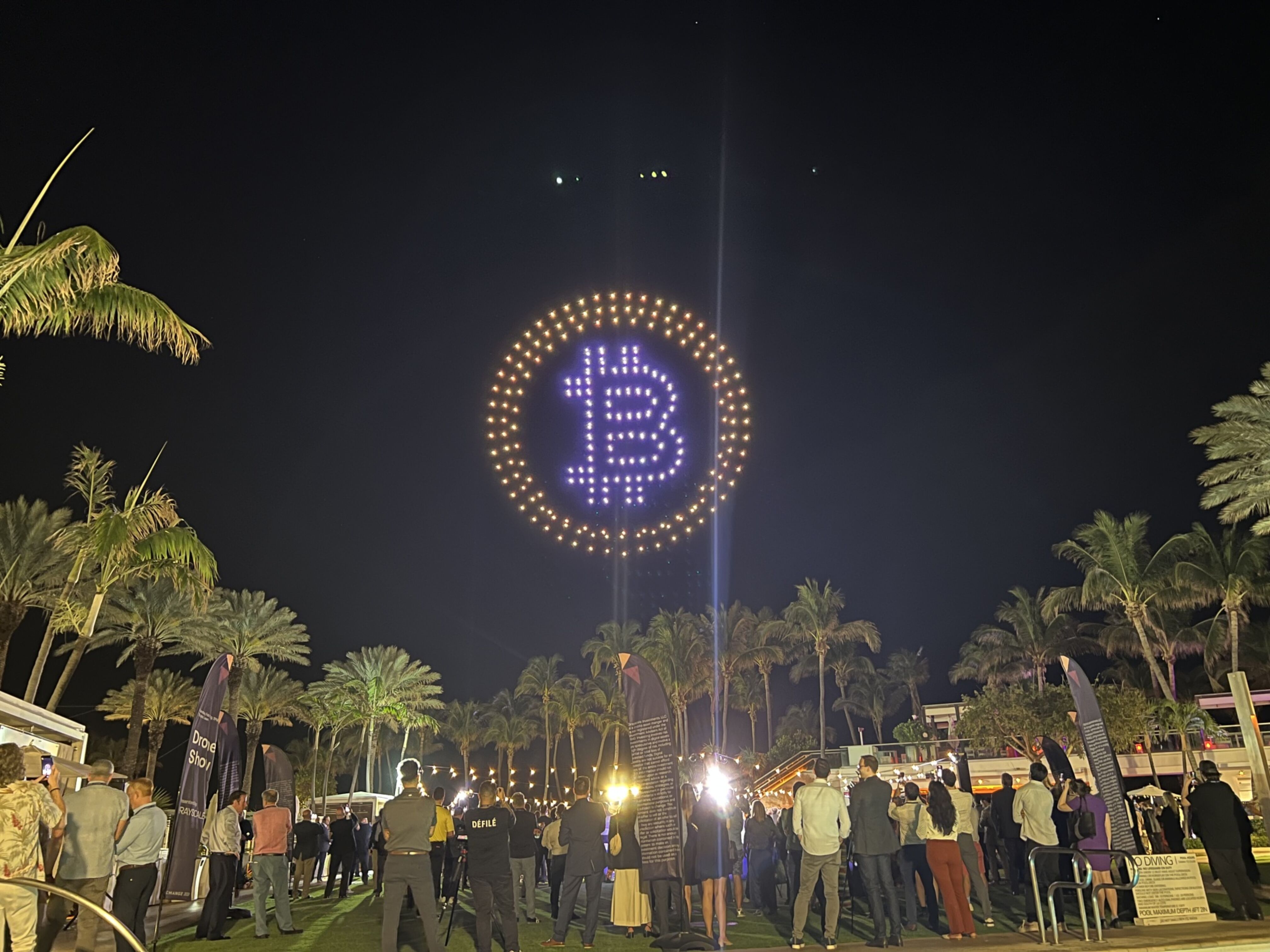 Grayscale uses drones to create the Bitcoin symbol at the Exchange conference in Miami, Florida.